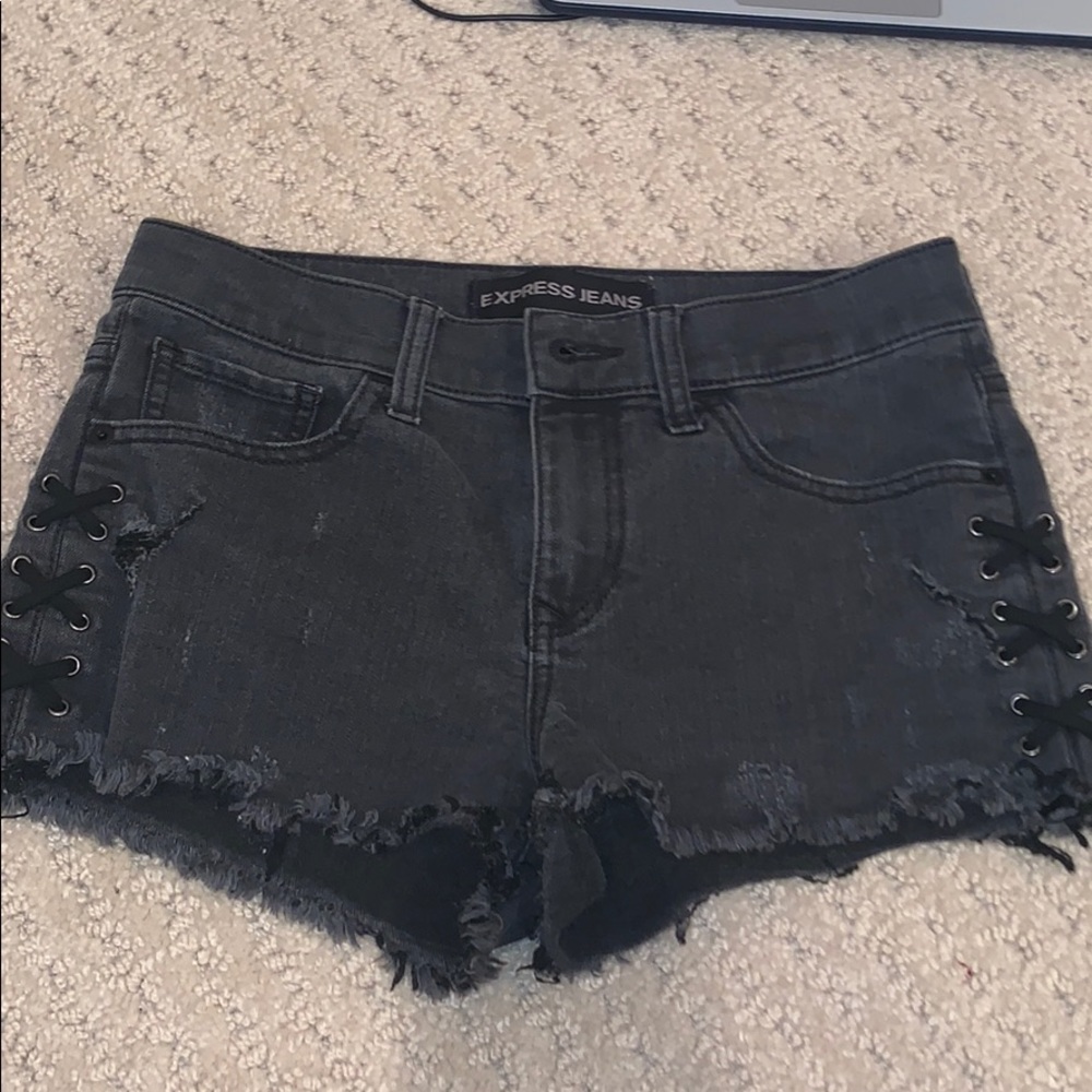express black jean shorts with lace x’s on sides